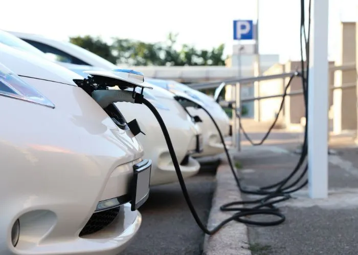 Electric vehicles being recharged