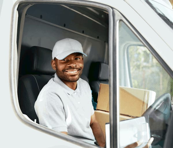 Delivery driver dressed in grey 