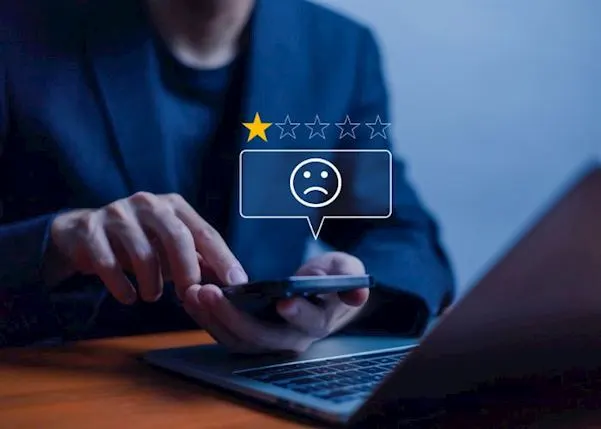 Image of a person leaving a negative review