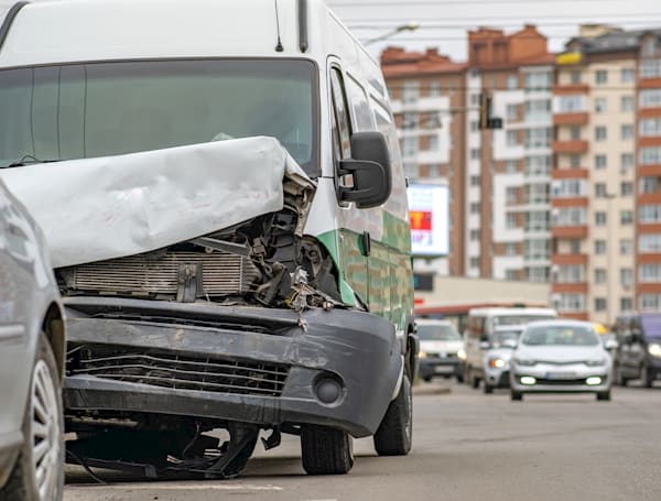 image of a van having been involved in an accident on the road