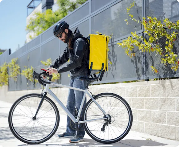 Courier using the job tracking app to find where his next job is located 