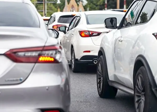 Cars in a queue of traffic