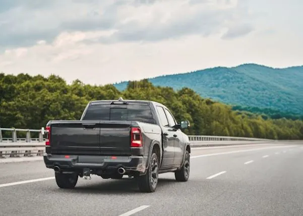 Pick-up truck speeding along a highway