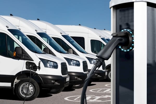 Image of an EV van fleet charging up