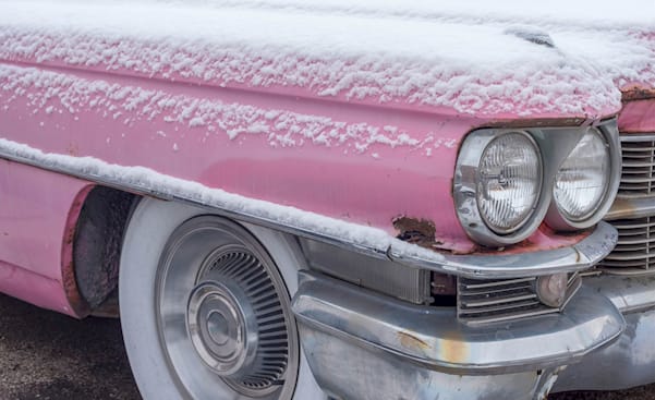 picture of a close up of a pink cadillac
