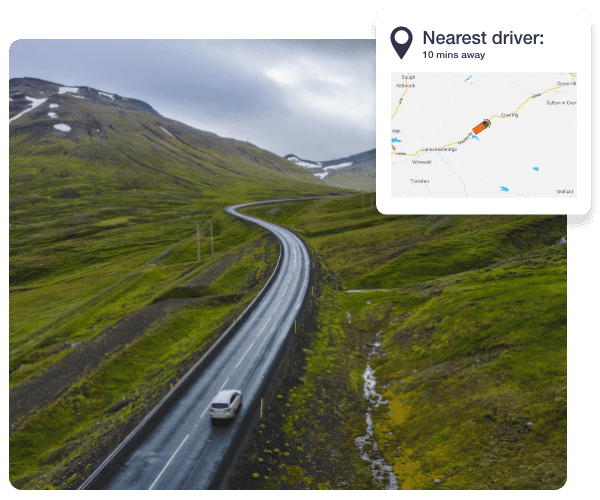 A white car is driving on the road and in the top right of the image on the live map it is showing the nearest driver to a location