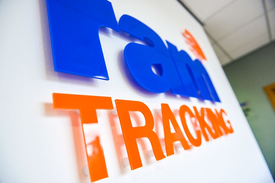 RAM Tracking logo on the wall inside our UK Based Office