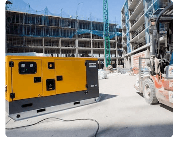 Picture of a large generator on a construction site tagged with a GPS asset tracker