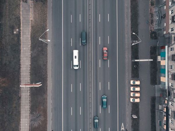Images of vehicles on a road.