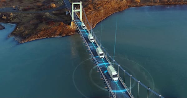 A line of vehicles on a bridge wioth graphics depicting which are being monitored and tracked sending out GPS waves