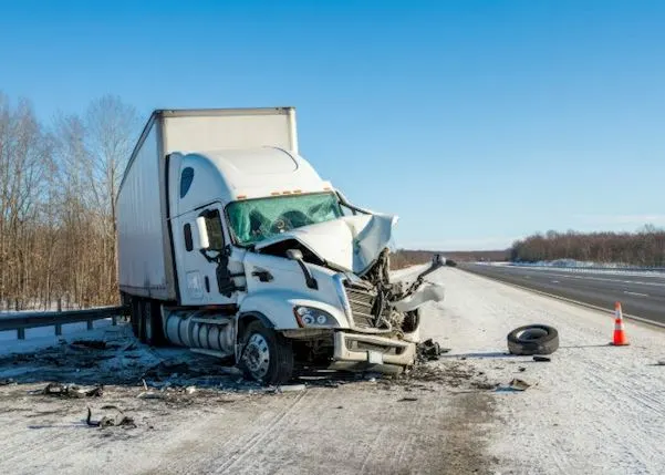 Crashed truck with a crumpled front bumper
