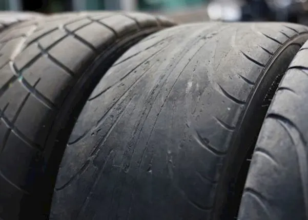 Tyres lined up with one worn out