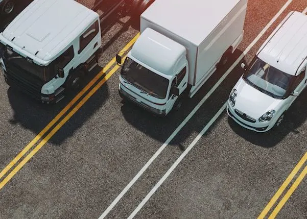 Row of mixed fleet vehicles