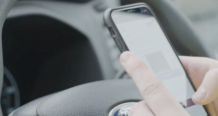 Driver performing a vehicle check