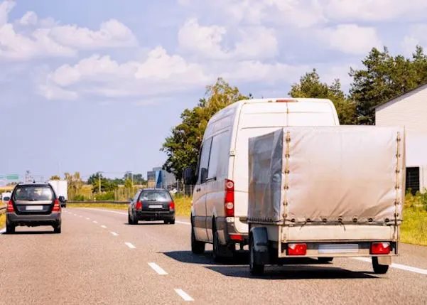 Van driving with a trailer